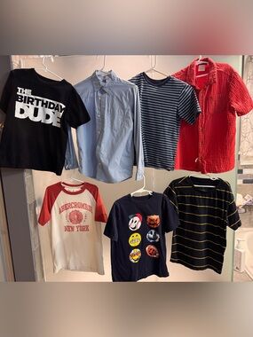 Bundle of  7 boys shirts size 7/8 and 9/10.